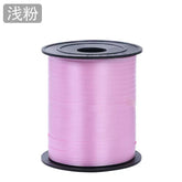 Curling Ribbon Roll(0.5CM*200M/Dark Pink) on a spool, perfect for gift wrapping and decorations.